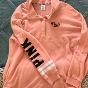 Gently worn. Soft orange. Pocketed sweatshirt. Nice hem line.